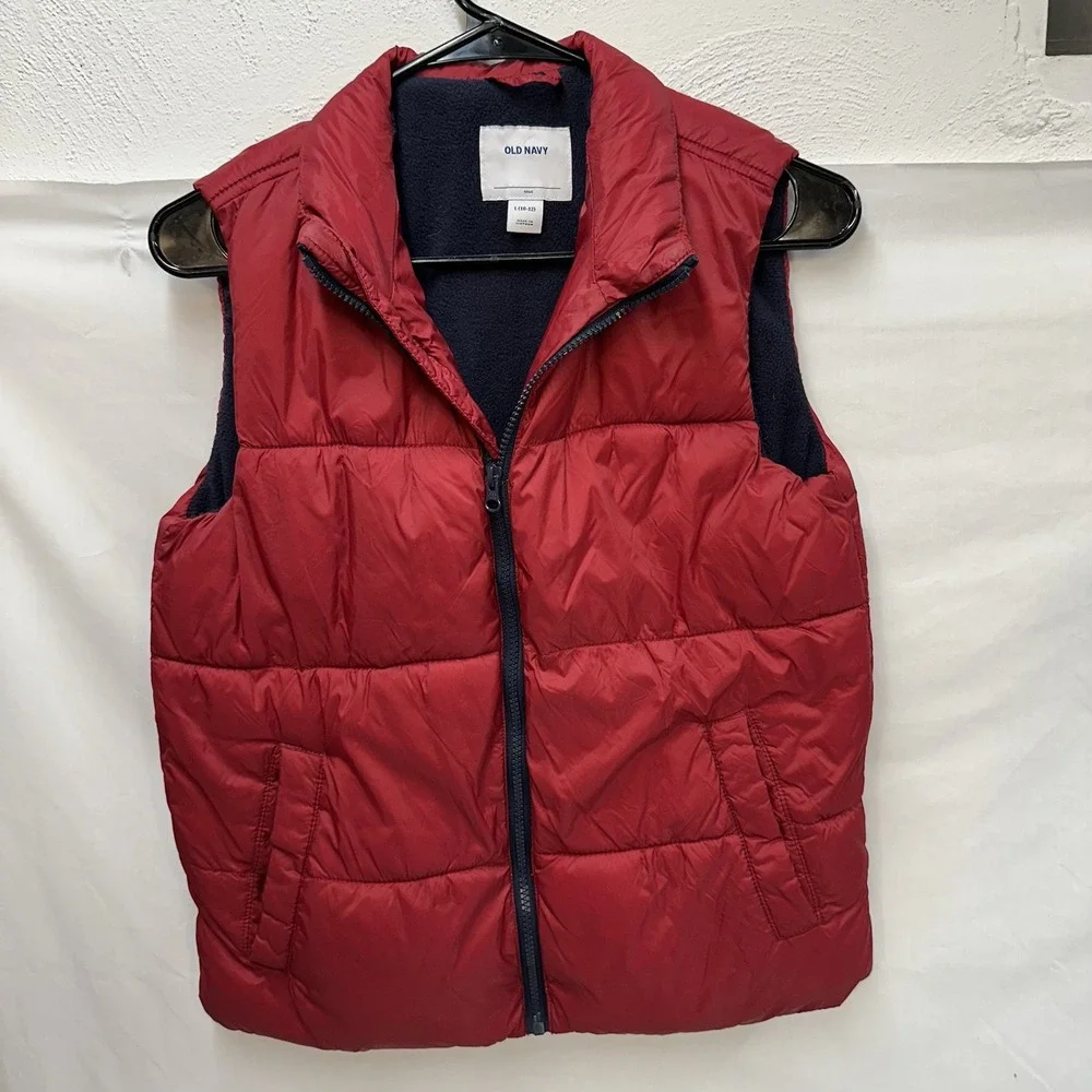Old Navy Water-Resistant‎ Puffer Vest Youth L Red with blue fleece lining.